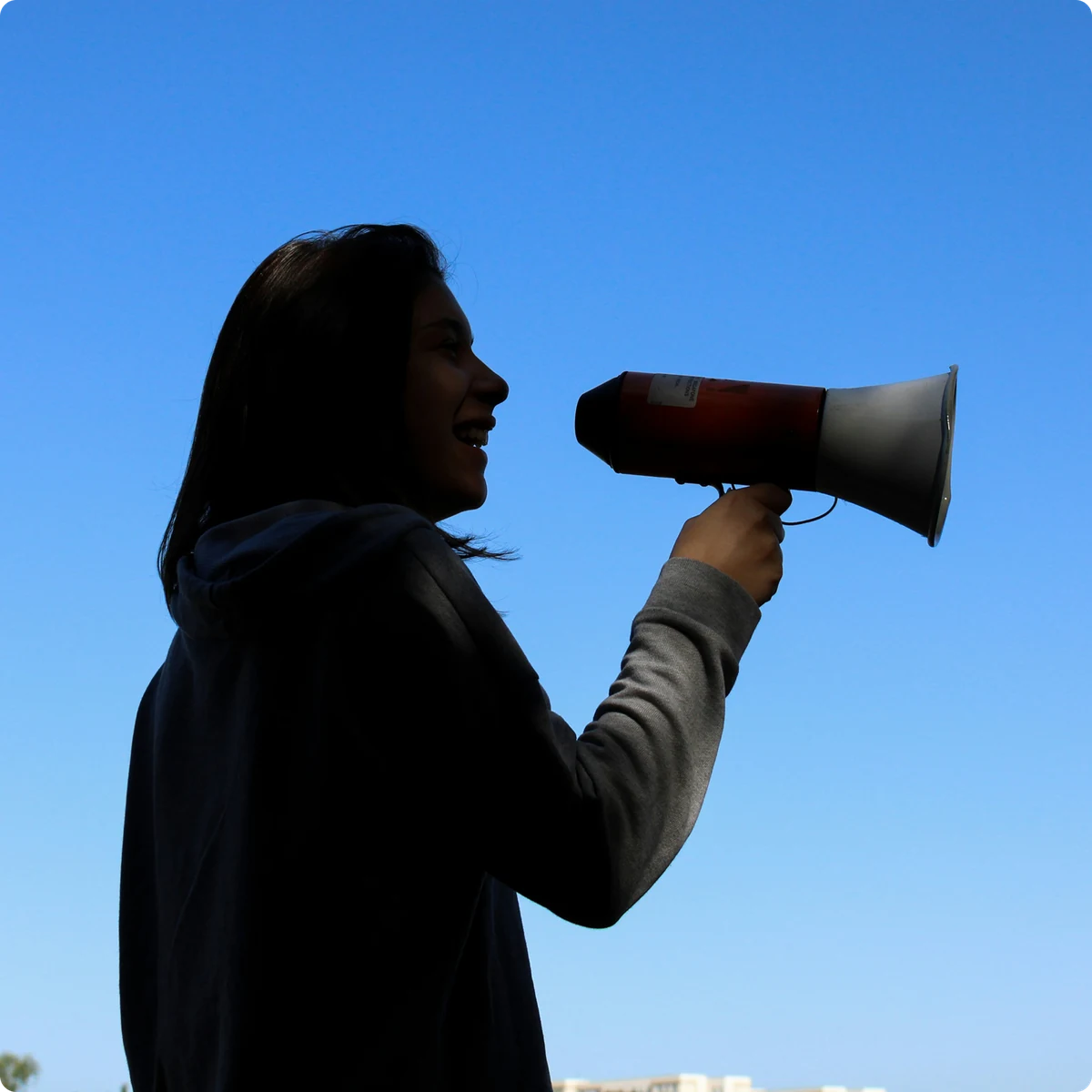 A person speaking through a megaphone